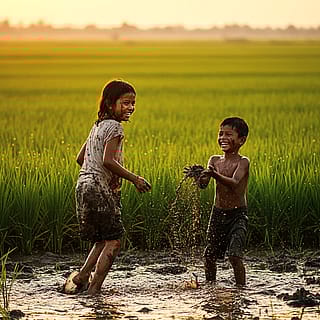 Running free, laughing in the mud — childhood at its purest'