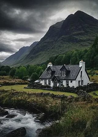 Irish Cottage along Countryside'