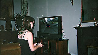 Old school female plays a video game Made with Recraft!'