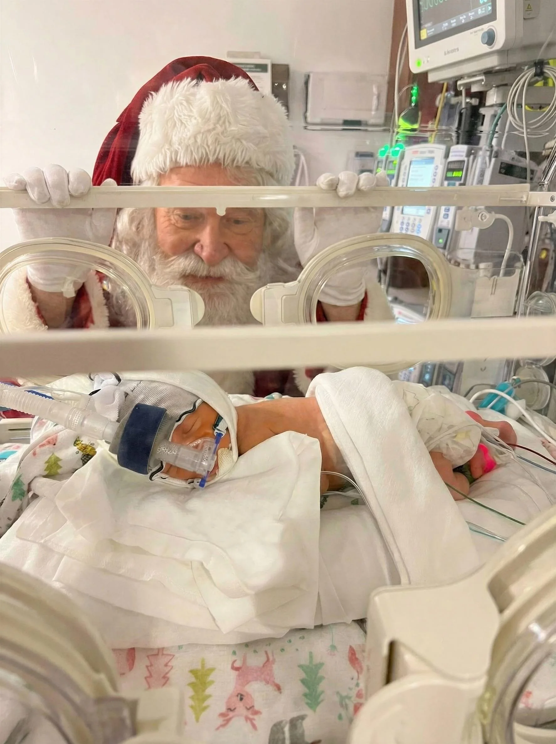 Santa visiting my grand daughter in the nic icu picture 1 of 1
