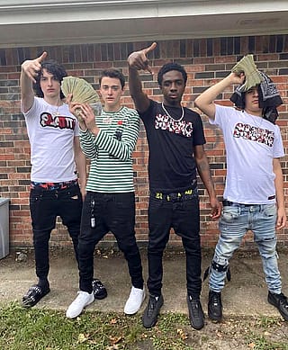 After surviving the Upside Down for years, the Stranger Things boys finally flipped it upside down and made it rain Netflix money'