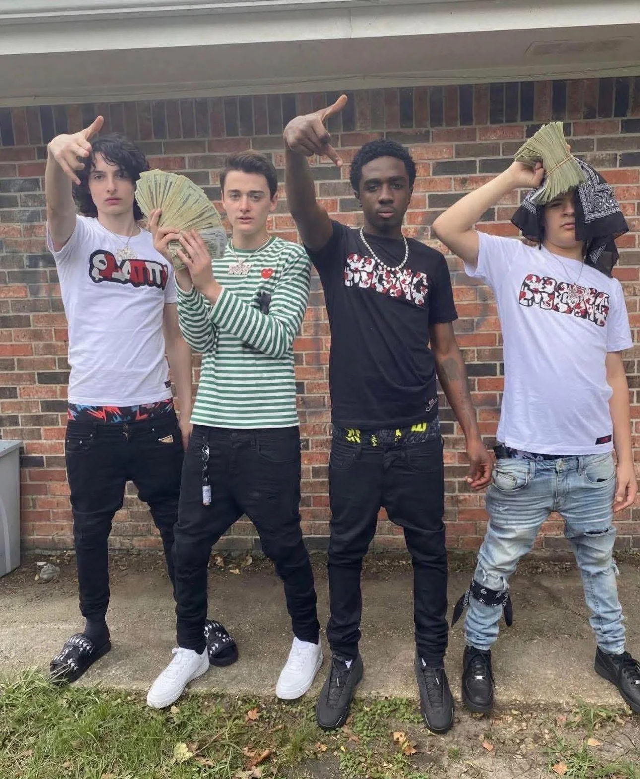 After surviving the Upside Down for years, the Stranger Things boys finally flipped it upside down and made it rain Netflix money picture 1 of 1