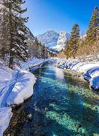 Nature’s Majesty: The towering mountains remind us of nature’s power and timelessness.'