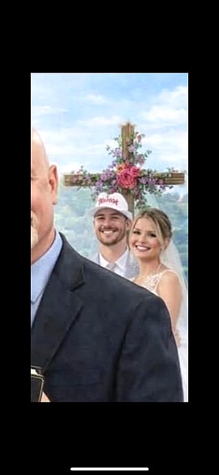 What would make my wife and I (or our likeness) be in the background of this picture? More info below.'