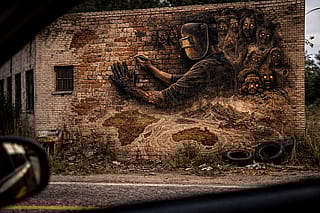 The brick that burnt the builder, ai mixed media on brick'