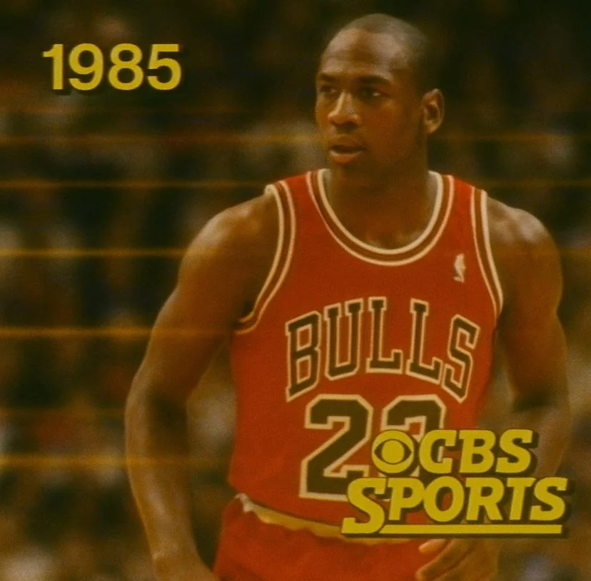 I asked ChatGPT to create 1985 NBA broadcast on CBS between the Bulls and the Celtics. Blurry 1985 analog cameras and all. picture 3 of 5
