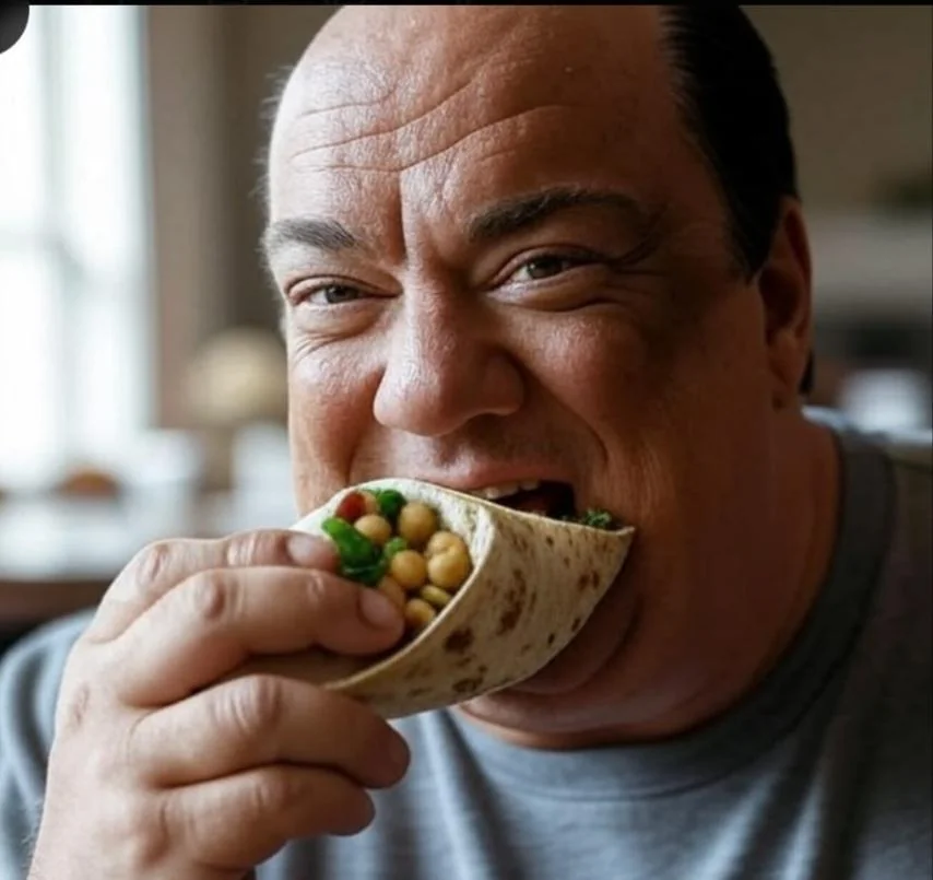 Paul Heyman eating burrito and baklava picture 2 of 2