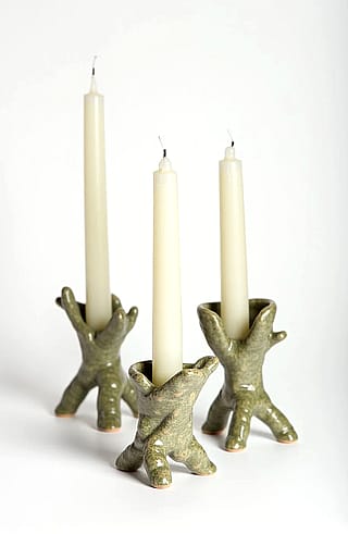 AI-generated candle holders'