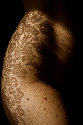 Shadow of a curtain on the skin'
