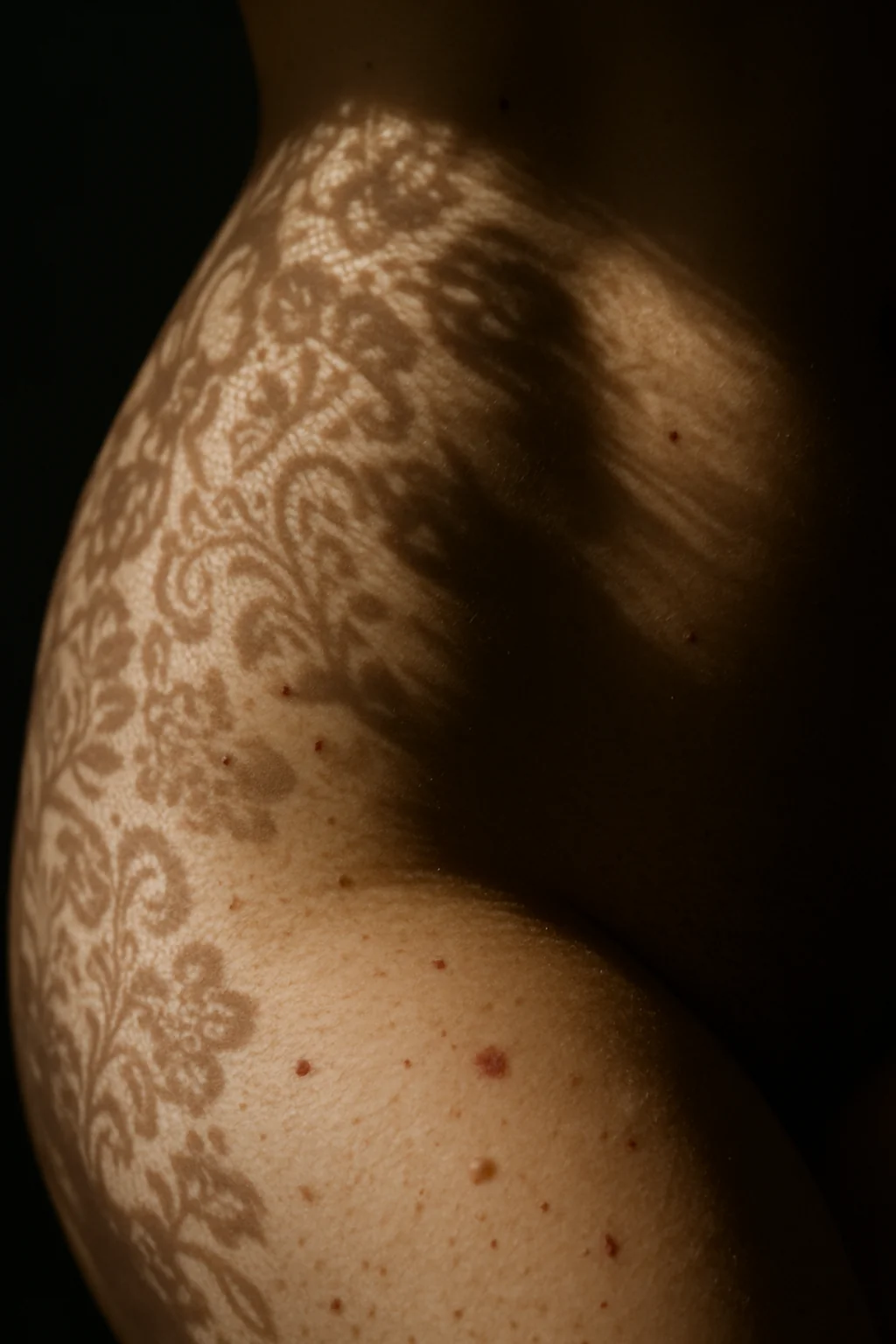 Shadow of a curtain on the skin picture 1 of 1